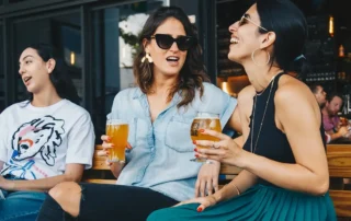 friends chatting at a pub