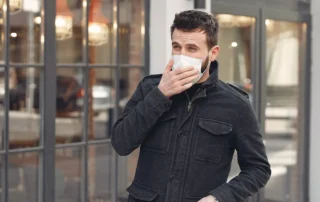 man wearing mask for cold/flu