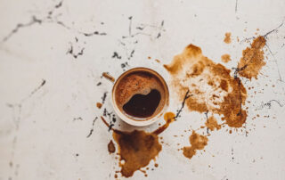spilled coffee on marble counter top